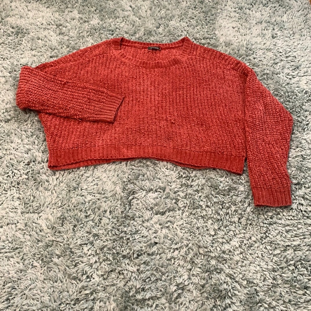 Red knitted sweater loose lightly oversize